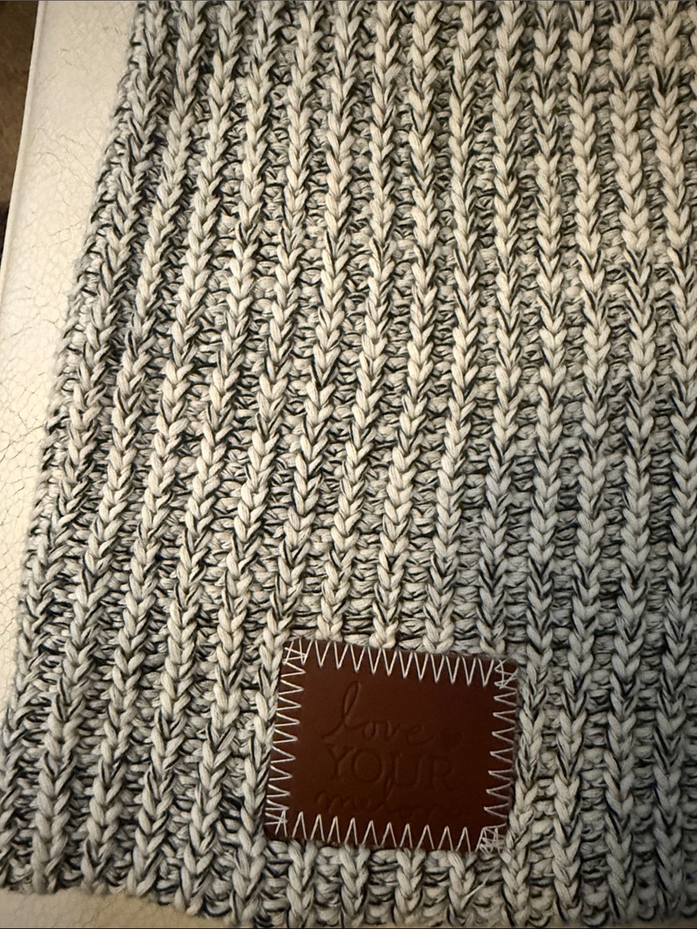 Love Your Melon Men’s Black and White Marled Knit Scarf with Leather Patch